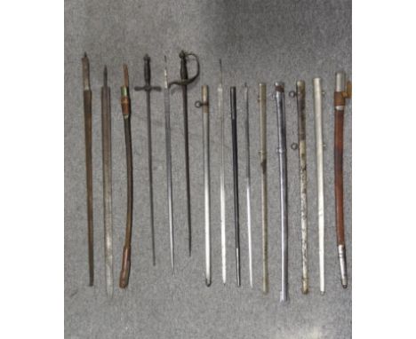 A SPANISH MODEL 1843 ARTILLERY OFFICER'S SWORD; A SPANISH MODEL 1886 MEDICAL OFFICER'S SWORD; FIVE DETACHED BLADES AND SEVEN 