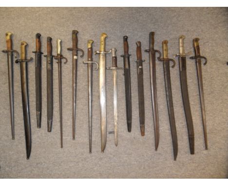 A FRENCH MODEL 1842 SABRE BAYONET; ANOTHER, MODEL 1859; TWO FRENCH MODEL 1866 CHASSEPOT SABRE BAYONETS; THREE FRENCH MODEL 18