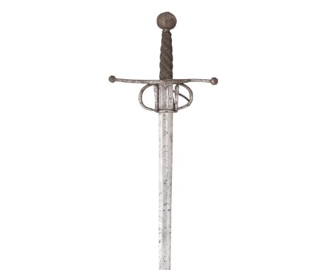 A GERMAN MILITARY BROADSWORD, LAST QUARTER OF THE 16TH CENTURY with double-edged blade of flattened-hexagonal section, stampe
