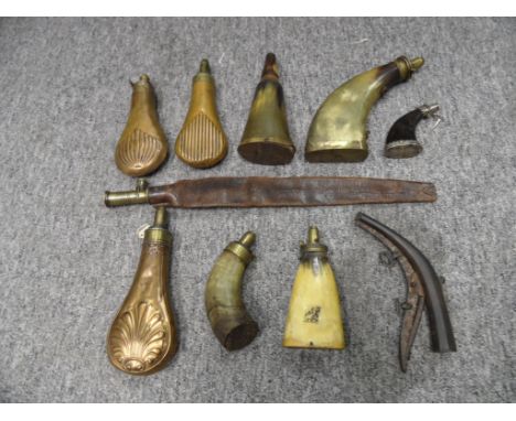 A SILVER-MOUNTED HORN FLASK DATED 1796; A BRASS-MOUNTED COWHORN FLASK; A LEATHER BANDOLIER BY DIXON & SONS, 19TH CENTURY; THR