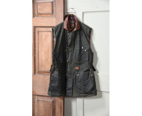 A MULBERRY SPORTING PURSUITS WAXED COTTON SLEEVELESS HUNTING JACKET with tan leather lined collar, the jacket lined in Mulber