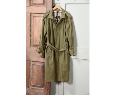 THE FIRST MULBERRY COTTON RAINCOAT J12 In heavy cotton gabardine, olive, with leather D rings at neck, waist and cuffs Size L