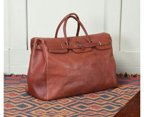 A MULBERRY CHESTNUT SADDLE GIRTHGRAIN LEATHER HOLDALL THE ORIGINAL 'IT' BAG INSPIRATION Designed by Roger Saul in 1975 for th