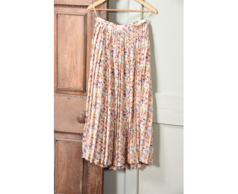 A MULBERRY PLEATED SILK FLORAL SKIRT With side button and zip fastening, lined size 12  Same purchased by Diana Princess of W