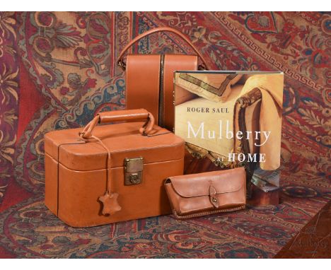 THE VERY FIRST MULBERRY BEAUTY CASE SAMPLE IN PIGSKIN DESIGNED BY ROGER SAUL, 1975 with hinged cover, the lid enclosing compa