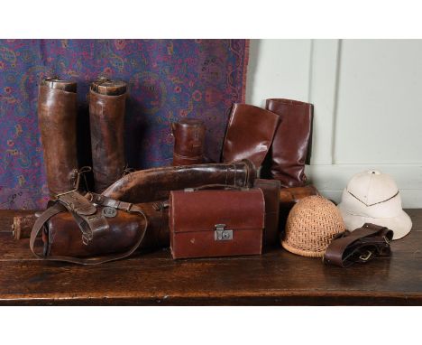 A COLLECTION OF VARIOUS LEATHER ITEMS WHICH WERE USED AS PROPS IN MULBERRY SHOPS OF MILITARY AND SPORTING INTEREST  Comprisin