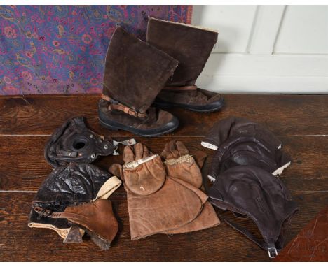 A COLLECTION OF VARIOUS VINTAGE AVIATION APPAREL  Comprising; a pair of Flying Combat leather boots, with fleece lining, a pa