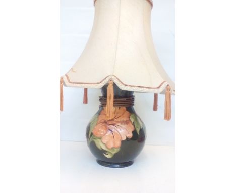 Moorcroft table lamp in the Coral Hibiscus pattern, 24cm in height not including shade 