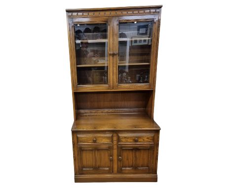 Mid-Century Ercol Old Colonial, Solid Elm Display Unit. Glazed Upper Unit over a Base Cupboard