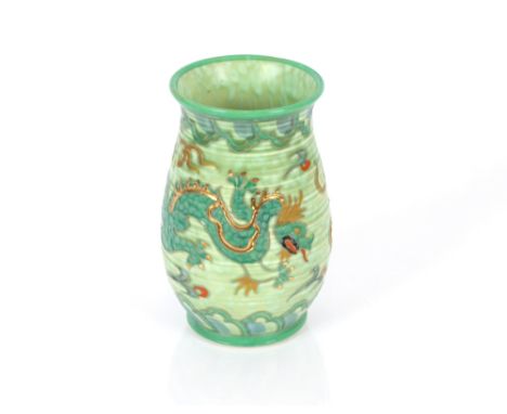 A Charlotte Rhead Crown Ducal vase with tube lined decoration of a dragon, signed to base, impress No.133, 17cm 
