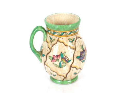 A Charlotte Rhead Crown Ducal jug with tube lined floral decoration, signed to base, numbered 6016, impress No146, 21cm high 