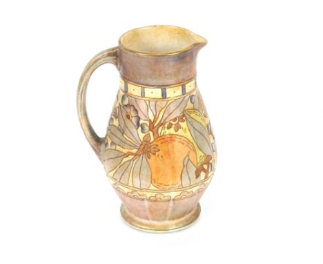 A Charlotte Rhead Bursley ware jug decorated with fruit, numbered to base TL5, 23cm high 