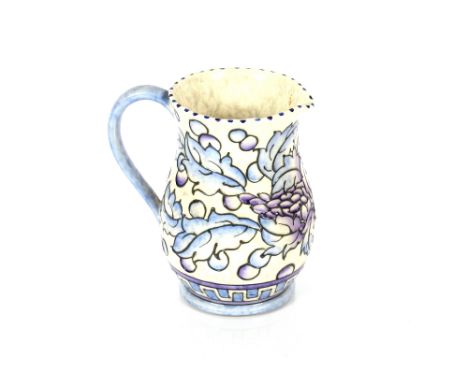 A Charlotte Rhead Bursley ware jug, numbered to base TL43, impress No.181, 15cm high 