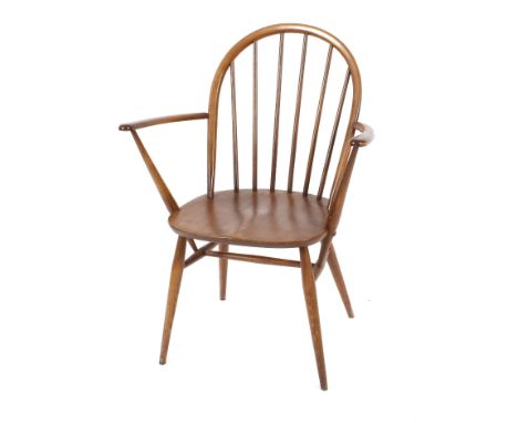 A set of five Ercol stick back dining chairs (three standards, two elbows)