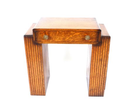 An Art Deco design oak pedestal writing desk fitted single drawer and end cupboards, 80cm wide x 40cm deep x 73cm high; and a