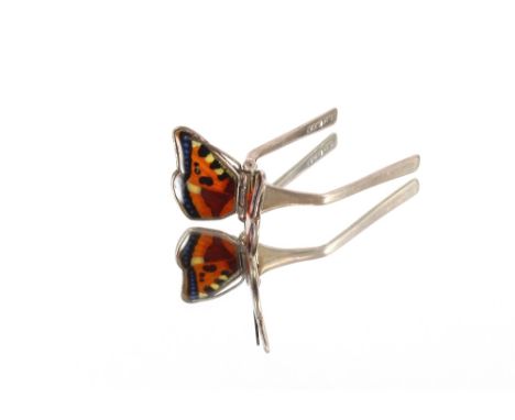 A pair of silver and enamel butterfly decorated sweetmeat tongs, makers mark C&amp;C possibly Cohen and Charles. 6.5cm x 3.5c