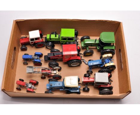An interesting group of model Tractors, various makers and scales to include John Deere 3140, Massey Ferguson 595, Ford 7710 