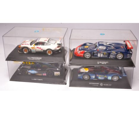 Scalextric slot car issues comprising Maserati MC12, MG Lola, Lister Storm LMP90 (cracks to casing) plus Porsche GT3R. All ap