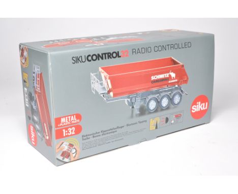 Siku Control 1/32 farm model issue comprising 6727 remote control Schmitz Tipping Trailer, excellent and secure in box.