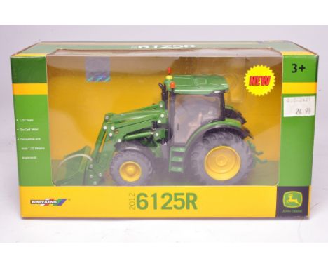 Britains 1/32 diecast farm model issue comprising John Deere 6125R Tractor with loader. Excellent, and secure in box.