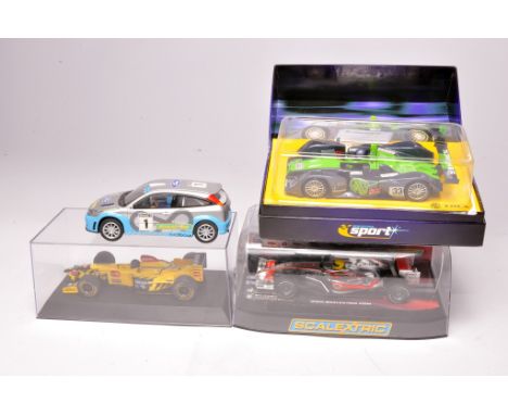 Scalextric slot car issues comprising Ford Focus (Unboxed), Jordan Honda f1, MG Lola LM and Vodafone McLaren Hamilton. All ap