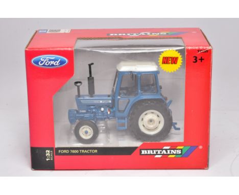 Britains 1/32 diecast farm model issue comprising Ford 7600 Tractor. Q Cab Edition. Excellent, and secure in box.