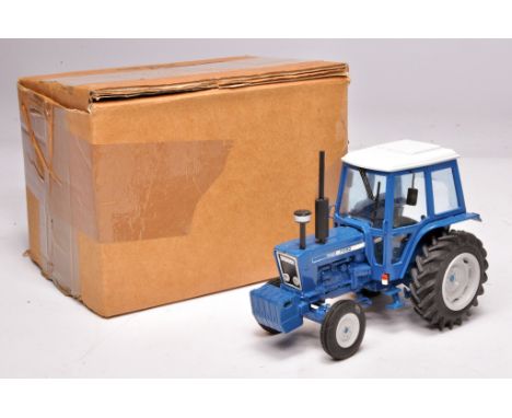 Denis Goodburn 1/32 hand-built farm model issue comprising a Ford 7600 Tractor. Displays with no obvious sign of fault. With 