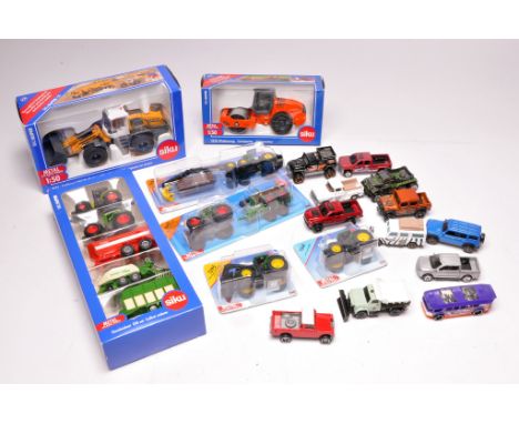 Assorted Siku smaller scale tractor and machinery models in original boxes, plus loose diecast cars, as shown.