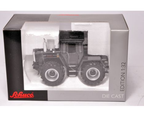 Schuco 1/32 diecast farm model issue comprising MB Trac Black Edition Tractor. Excellent, and secure in box.