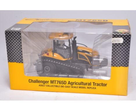 USK Scalemodels farm issue comprising Challenger MT765D Agricultural Tractor, excellent and secure in box.