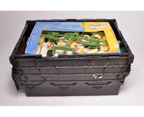 Assorted loose playworn Bruder Plastic large scale farm toys including unused boxed Krone Whirl Rake.