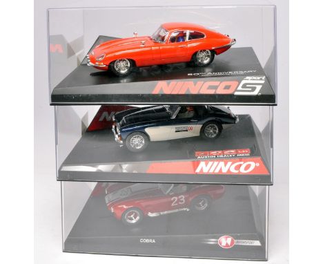 Ninco slot car issues comprising Jaguar E-Type Coupe, Austin Healey Softop and Shelby Cobra. All appear without fault in orig