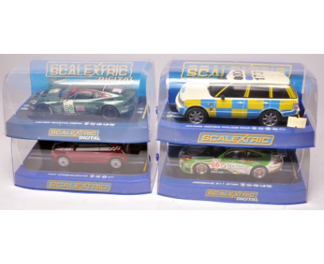 Scalextric slot car issues comprising Range Rover Police Car, Porsche 911 GT3R, Aston Martin DBR9 and Fiat Cinquecento. All a