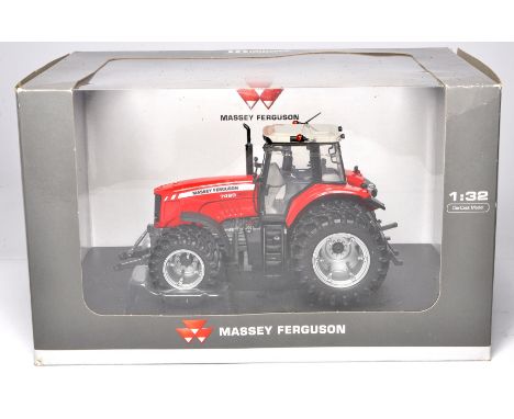 Farm Model Issue comprising 1/32 Universal Hobbies Massey Ferguson 7499 - Dual Wheels. Excellent and secure in box.