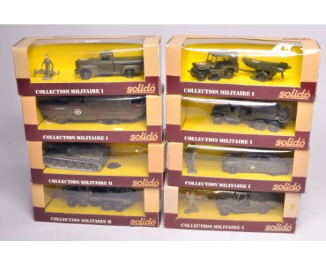 Group of Solido diecast Military Vehicles comprising 6023 Renault Covered Van, 6041 Jeep Zodiac, 6040 Dodge Pickup, 6044 GMC 