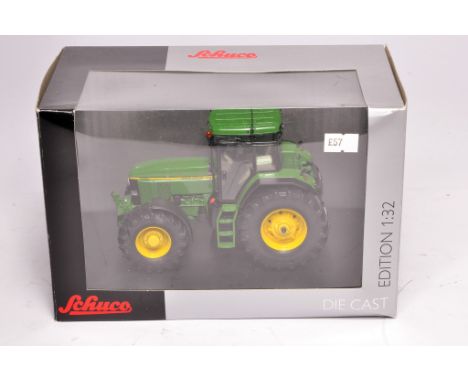 Schuco 1/32 farm model issue comprising John Deere 7810 - excellent and secure in box.