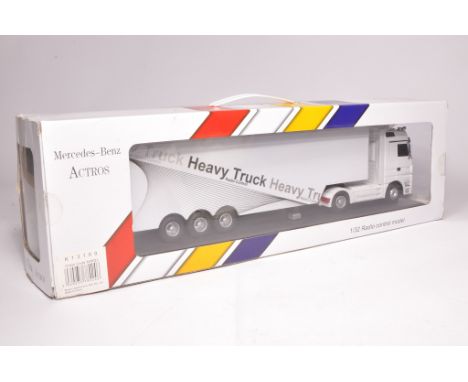 Radio Controlled 1/32 model truck issue comprising Mercedes-Benz Actros, excellent and secure in box.