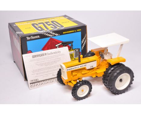 Ertl 1/16 farm model issue comprising 1994 National Farm Toy Show Collector's Edition Minneapolis Moline Tractor. Looks to be