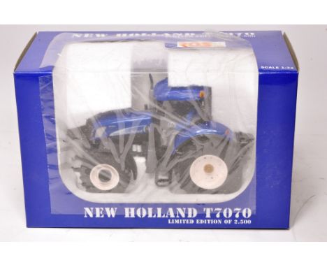 ROS 1/32 diecast farm model issue comprising New Holland T7070 Tractor. Excellent, and secure in box.