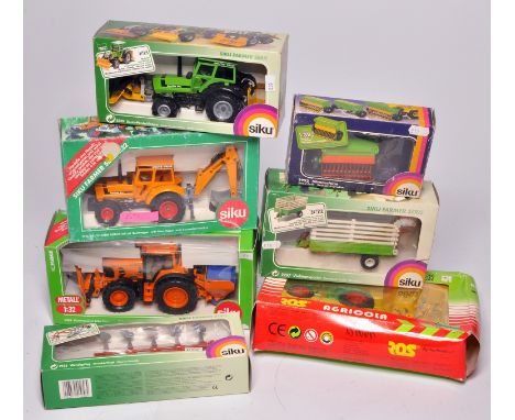 A group of boxed Siku 1/32 diecast farm model issues. Mostly look to be excellent in boxes, albeit boxes do have storage wear