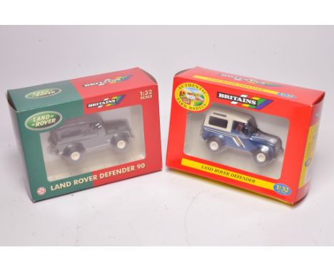 Britains duo of 1/32 farm model Land Rovers comprising no's.9507 Defender and 40547 Defender 90, excellent in unopened boxes.