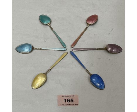 A set of six George V silver gilt and coloured enamel coffee spoons. Birmingham 1929. 2ozs 10dwts