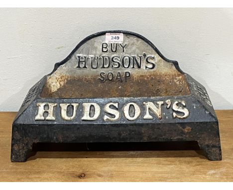 A Victorian cast iron advertising dog water trough for Hudson's Soap. 16" wide.