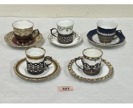 Five cabinet cups and saucers with pierced silver holders to comprise two Aynsley and three Crescent examples. 3ozs 10dwts si