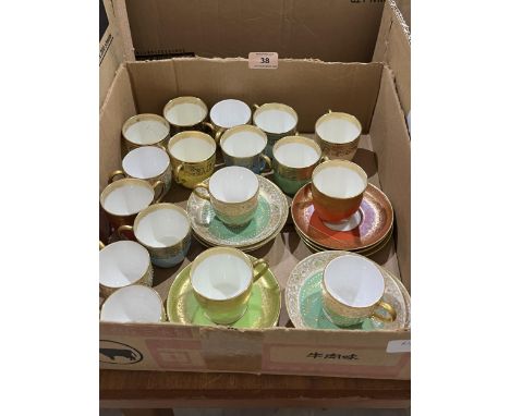 A collection of Royal Worcester and Cauldon cups and saucers.
