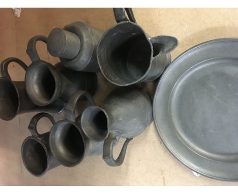 A Collection of pewter including tankards an tea caddy.