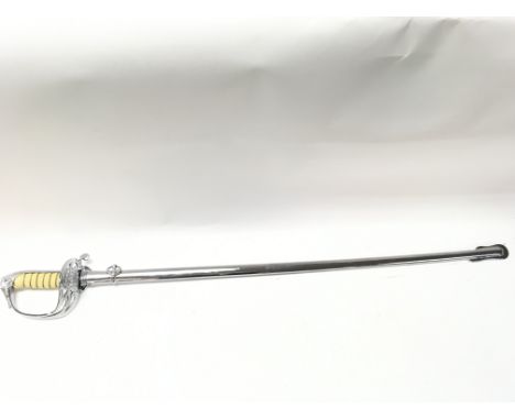 Thailand naval officers sword with elephant head pommel, shagreen hand grip, chrome scabbard and hand guard. 94cm long in tot