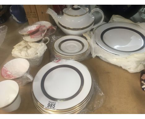 A Royal Doulton Harlow tea dinner service comprising cups saucers, teapot and dinners plates .