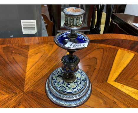 A Doulton Lambeth candle stick. Postage category D.