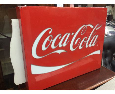 A vintage Coca Cola electric light sign, dimensions 76x60cm. This lot cannot be posted